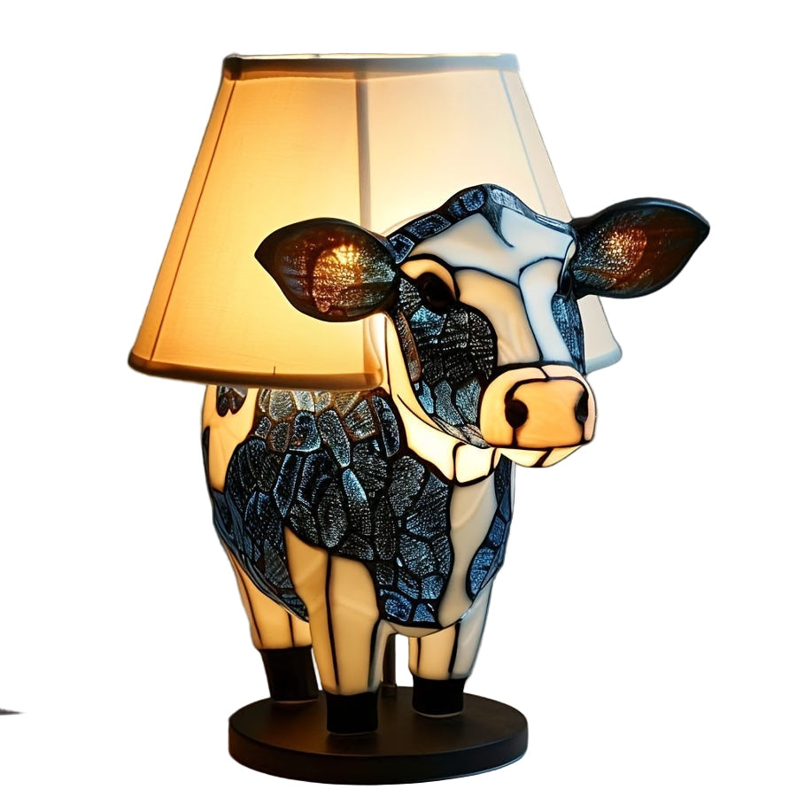 Dekorativ bordslampa formad som en ko