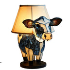 Dekorativ bordslampa formad som en ko