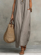 Vestido maxi casual para mujer con escote en V, ribete con volantes y bolsillos laterales prácticos  