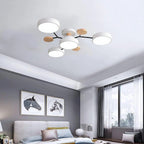 Modern LED-taklampa med flera armar, halvt infälld