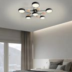 Modern LED-taklampa med flera armar, halvt infälld