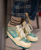 Sneakers basse con lacci e stampa floreale