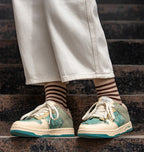 Sneakers basse con lacci e stampa floreale