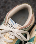 Sneakers basse con lacci e stampa floreale