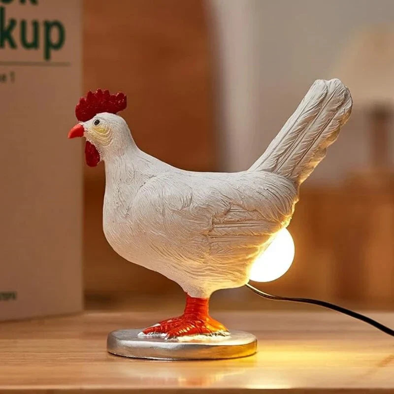 Dekorativ LED-bordslampa i form av en kyckling