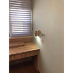 Aplique de pared con brazo oscilante ajustable