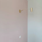 Aplique de pared con brazo oscilante ajustable