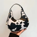 Bolso de hombro Crescent con estampado animal