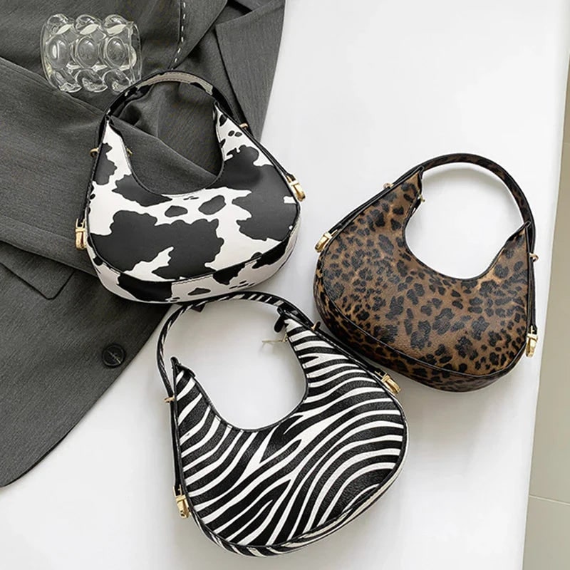 Bolso de hombro Crescent con estampado animal