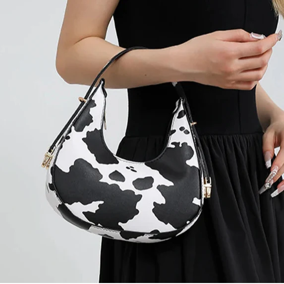 Bolso de hombro Crescent con estampado animal