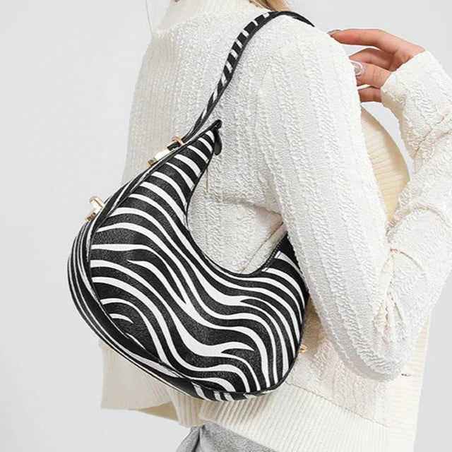 Bolso de hombro Crescent con estampado animal